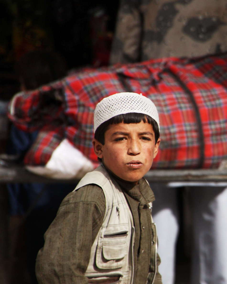 Tem  |  Boy at Afghan market
