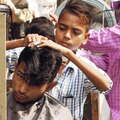 Delhi  |  Young barber at Chawri Bazar