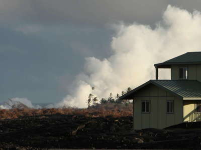 Kalapana  |  Homes on lava and steam plume