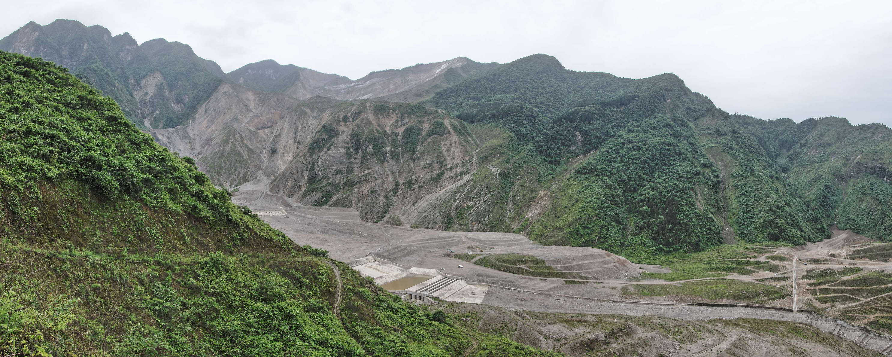 The Wenjia Landslide, triggered by the Wenchuan Earthquake of May 12, 2008, has mobilized a huge amount of material which was converted into debris flows by subsequent rainfall events. Extensive remediation works were carried out to protect the downstream communities and infrastructures. WI_cn059b.jpg