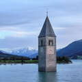 Graun | Reschensee with clock tower