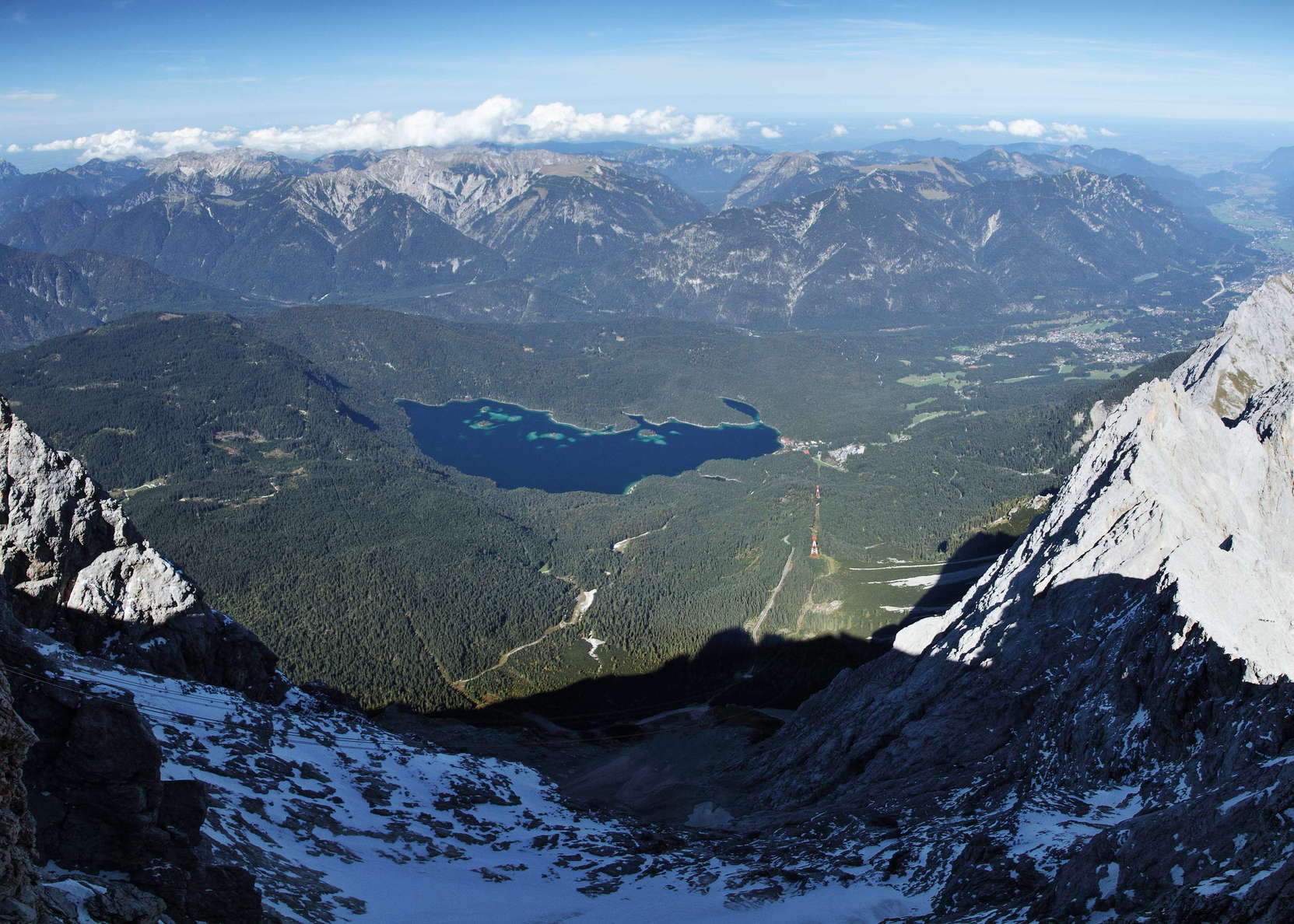 View from the summit area of Zugspitze. Lake Eibsee was originally impounded by a Pleistocenic moraine. Its shape was modified after, still in prehistoric times, a major rock avalanche had been released from the north slopes of Zugspitze, impacting the lake area. WI_ge001_506.jpg