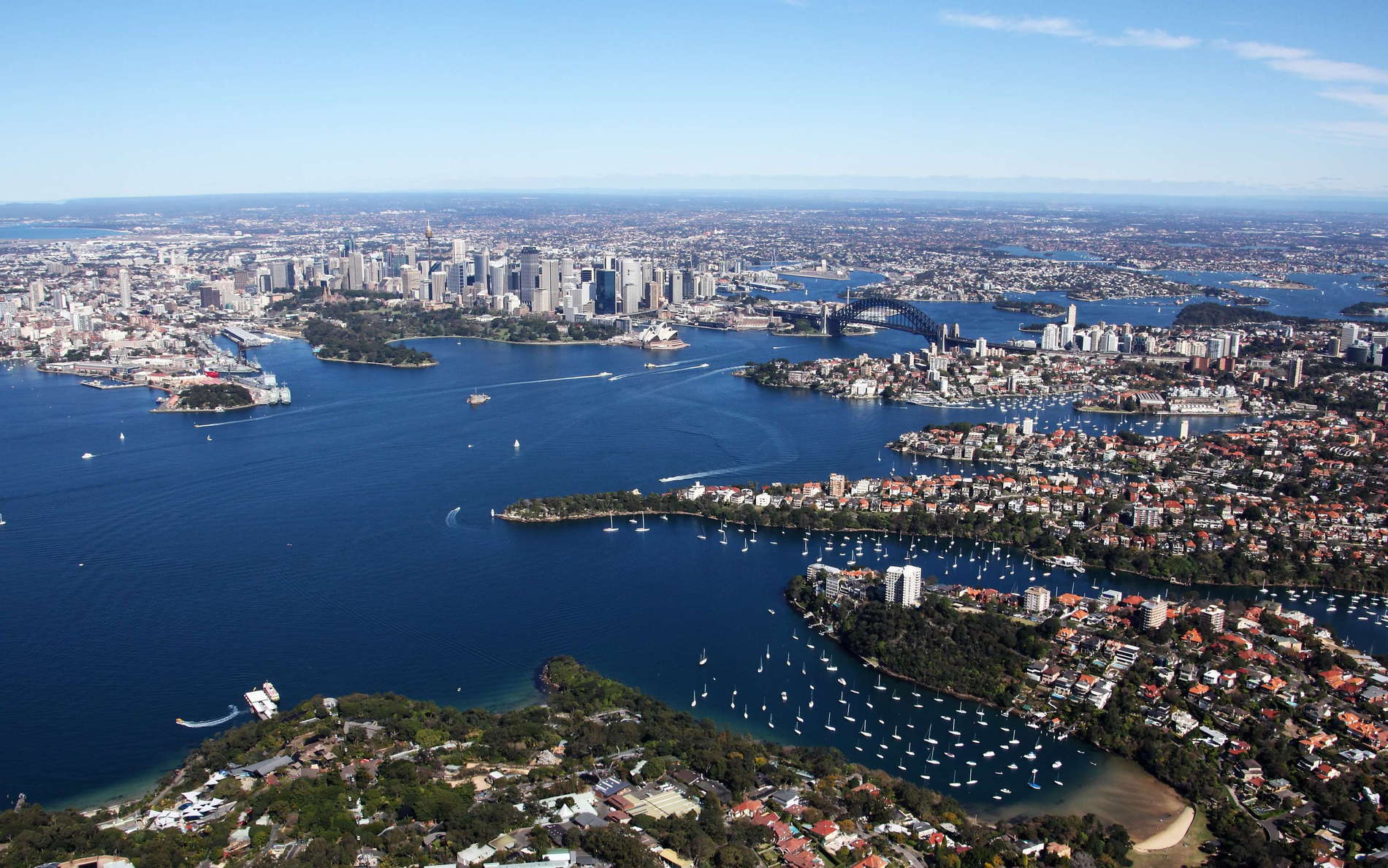 Southwestward view across the Sydney Harbour to the CBD and the Harbour Bridge. The Mosman Bay and the Taronga Zoo appear in the foreground of the image. WI_nw005a.jpg