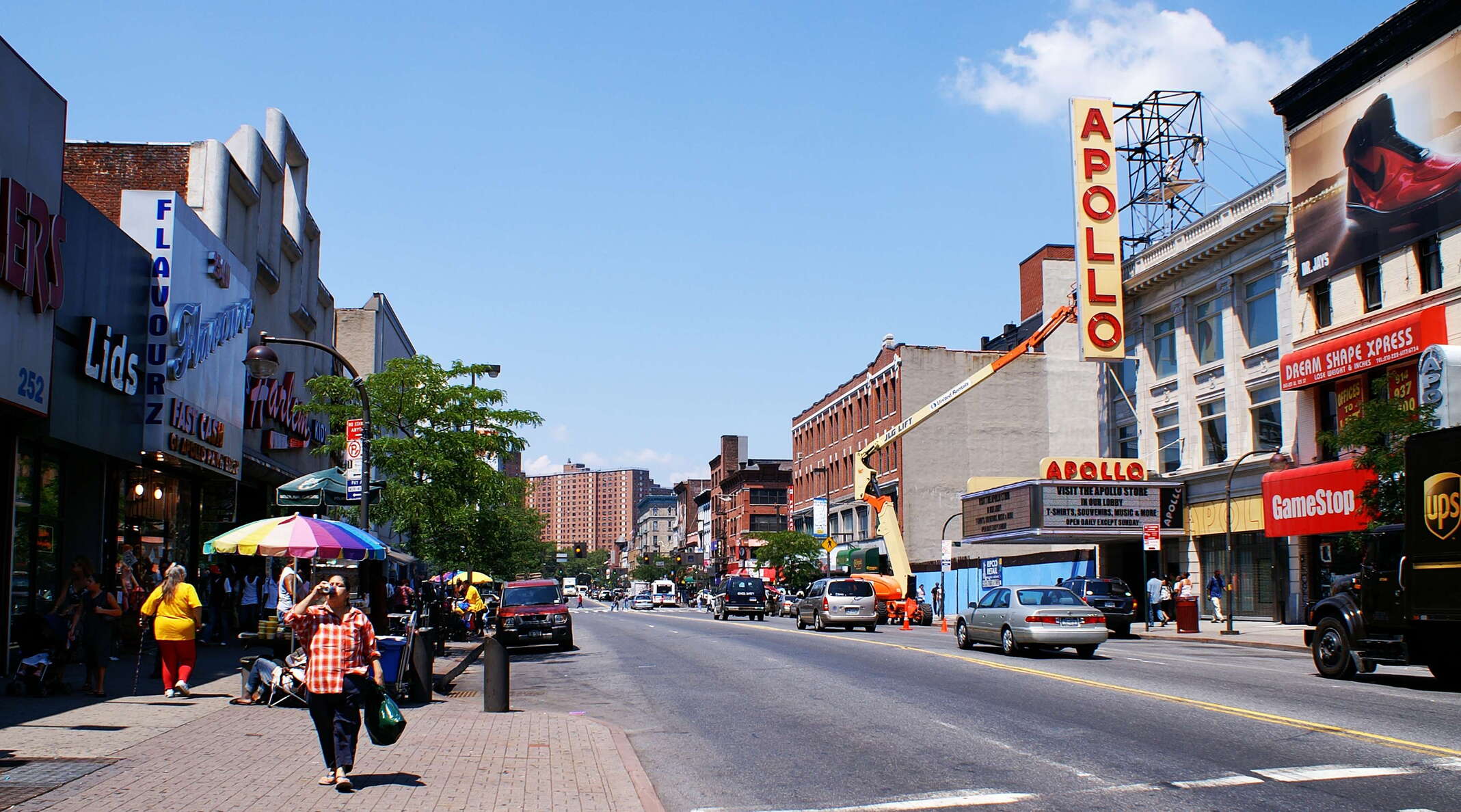 Martin Luther King Boulevard. The neighbourhood of Harlem became a major African-American centre from the early 20th century onwards, with the Apollo Theater (right portion of the image) being an important institution of African-American culture. Throughout much of the second half of the century, the neighbourhood had a bad reputation in terms of poverty and crime. The situation changed from the 1990s onwards, and gentrification became a well-known issue in Harlem. WI_ny113.jpg