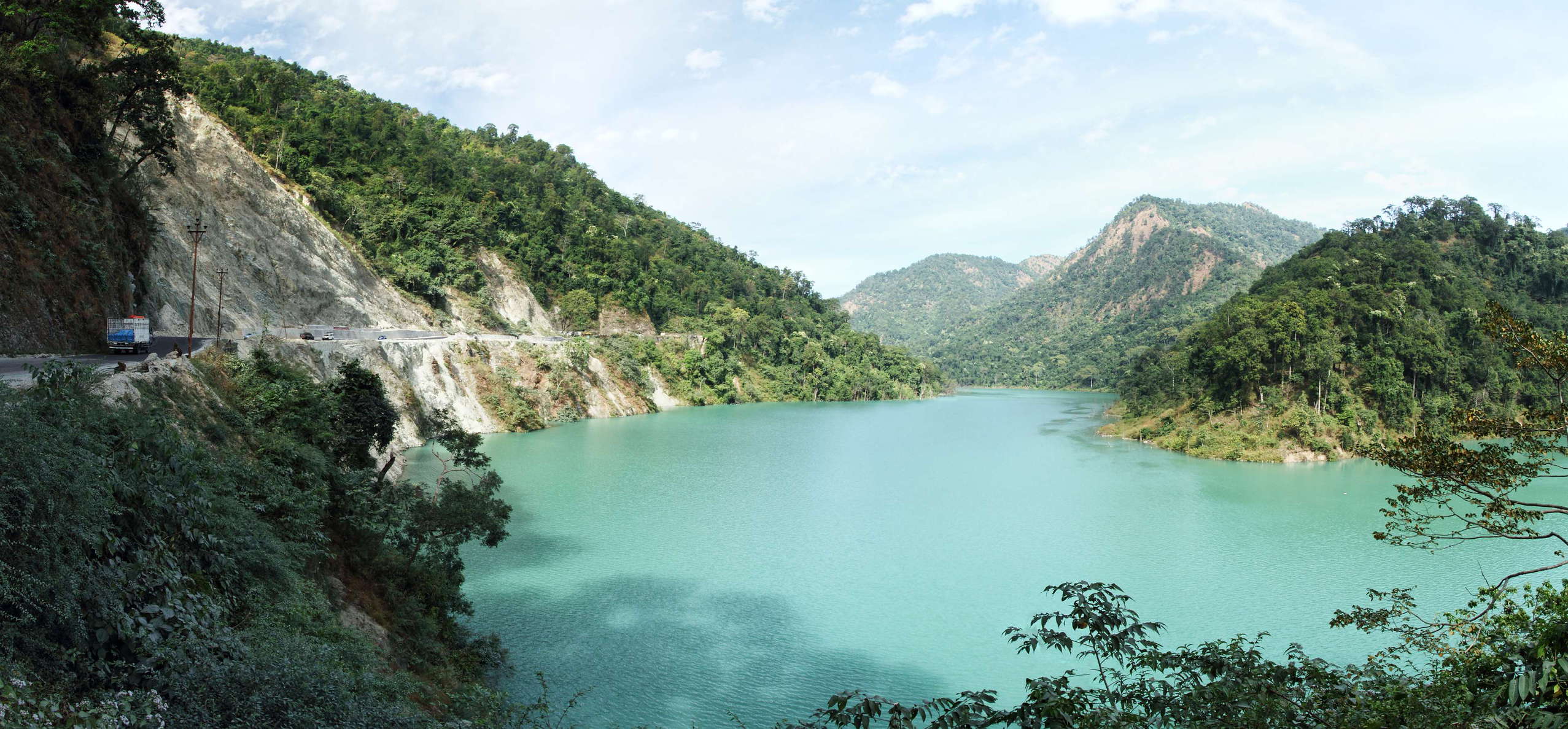 Panoramic view up the reservoir of the Teesta Low Dam-IV Hydroelectric Power Plant in northern direction. The landslide on the left side of the photograph is a recent phenomenon, most likely related to changes in the slope water conditions due to reservoir filling. However, landsliding is maybe less dangerous for travellers at this site than the aggressive, potentially rabid monkeys roaming the roadside. WI_in129.jpg