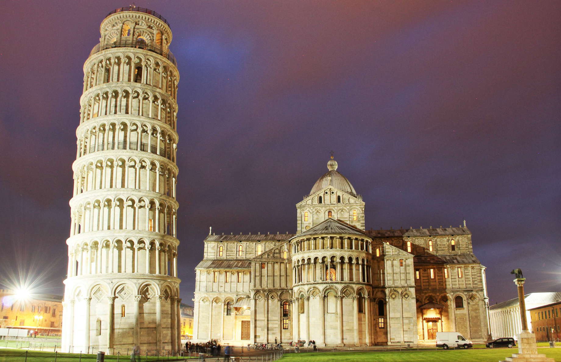 Piazza dei Miracoli. The construction of the campanile of the Duomo di Pisa started in the 1170s and took about 200 years. Due to soft ground on one side, the tower started to incline already during construction. The movement continued afterwards, until stabilization works took place in the late 20th and early 21st Century. The cathedral and its campanile are both examples of Romanesque-Style architecture. WI_e2104_001a.JPG